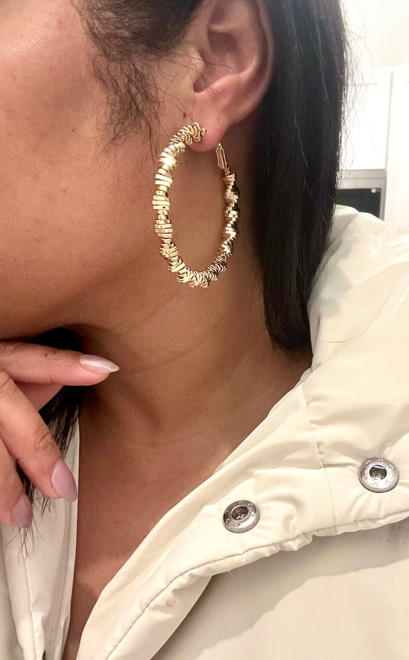 Diamond cut spiral hoop Earring